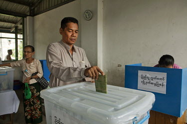 People vote in by-elections in Yangon.