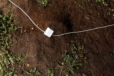 A computer cable lies on the ground at a meeting of tribal leaders in the village of Lapetanha, in the Brazilian Amazon, arranged to discuss projects such as reforestation and tourism. The Surui had h...