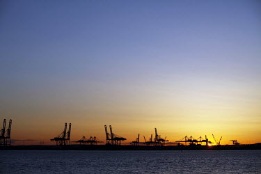 The Elizabeth Port Authority Marine Terminal, in New Jersey at sunset.