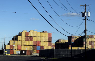 Stacks of empty shipping containers stacked at the Elizabeth Port Authority in New Jersey.