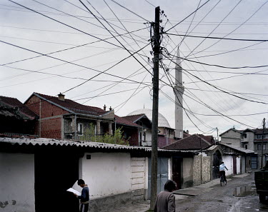 A web of cables emanate from a telegraph pole in a district of Gjakova populated by a minority group known as the Egyptians.