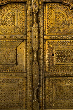 Architectural details of golden doors in the City Palace. The City Palace is a complex of palaces in central Jaipur built between 1729 and 1731 by Jai Singh II, the ruler of Amber.