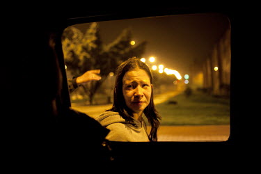 A local woman has just escaped from her boyfriend who violated her. Violence and crime rates are high in the slums south of Bogota. Most of the residents in this area are internally displaced, who iro...