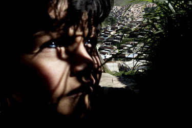 Nine year old Luiz Guillermo Rendon lives in Soacha slum just outside Bogota. His family fled their home in Tolima, west of Bogota, when a local paramilitary group killed his father, and threatened hi...