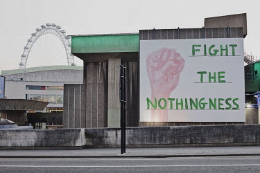 A billboard reads 'fight the nothingness' with the London Eye in the background.
