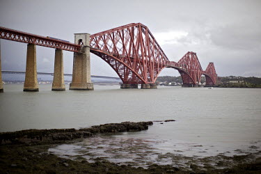 The 125 year old Forth Rail Bridge, which spans the river Forth near Edinburgh. Network Rail, the operator of the rail track that leads over the bridge, has spent 10 years and GBP 130 million repainti...