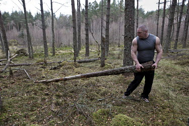 43 year old Jason Young, a veteran highland games man, hunts for cabers near his house in Tain, north of Inverness. He is the seven time winner of the Cowal Gathering, the largest Highland games in Sc...