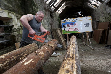 43 year old Jason Young, a veteran highland games man, saws cabers near his house in Tain, north of Inverness. He is the seven time winner of the Cowal Gathering, the largest Highland games in Scotlan...