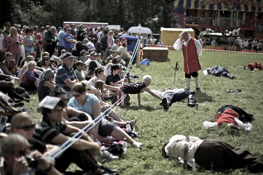 Performers entertain the crowds with stories of Clan battles, linking the Highland games to its historic roots and explain the events cultural signifance, at the Callander Highland Games, Stirlingshir...