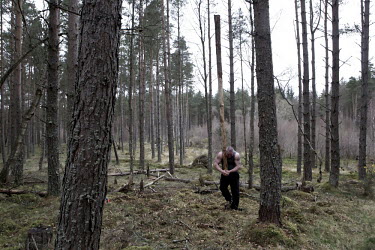 43 year old Jason Young, a veteran highland games man, hunts for cabers near his house in Tain, north of Inverness. He is the seven time winner of the Cowal Gathering, the largest Highland games in Sc...