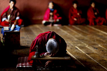 Monks pray at the Taktsang (Dzong) Monastery high up in the Paro Valley.