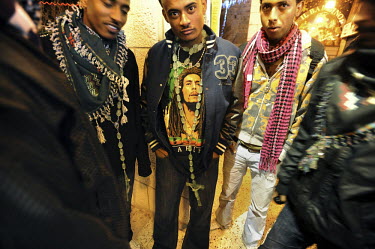 Eritrean asylum seeker youth, who reside in Tel Aviv, hang out at Mangar Square, as their community celebrates the Coptic Christmas in Bethlehem, West Bank.