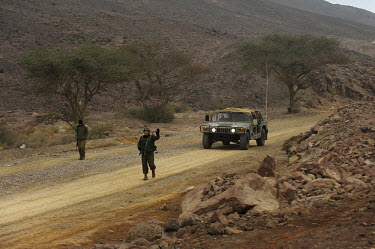 Israeli soldiers patrol the Israel-Egypt border.