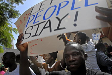 Men during a large protest march, in which hundreds of African asylum seekers marched through the streets of Tel Aviv, calling Israeli authorities to grant them asylum.