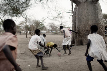 A group of boys play football in the Doro refugee camp.  More than 500,000 people have fled from Sudan into South Sudan as a result of the ongoing conflict between the two states.