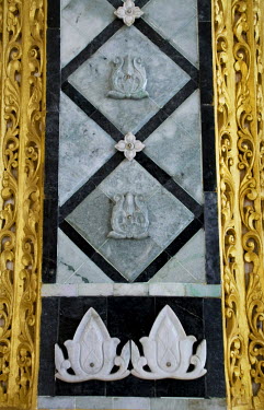 Detail of a pillar in the Pyithu Hluttaw or lower house of Burma's new Parliament. The central inlays are green and white jade from Kachin state.