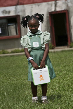 A young student with her laptop at the Bayelsa State College of Education (BYCOE) given to her as part of the One Laptop per Child (OLPC) project. This seeks 'to create educational opportunities for t...