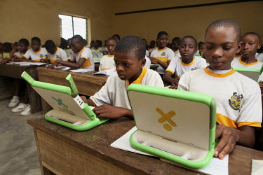 Students using their laptops at the Community Secondary School Rumuomasi as part of the One Laptop per Child (OLPC) project. This seeks 'to create educational opportunities for the world's poorest chi...