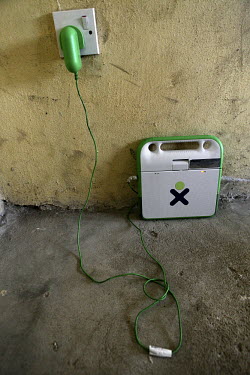 A laptop being charged at the Community Secondary School Rumuomasi as part of the One Laptop per Child (OLPC) project. This seeks 'to create educational opportunities for the world's poorest children...