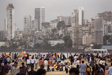 The popular Chowpatty beach is loaded with working and middle class Indians on a national holiday weekend.