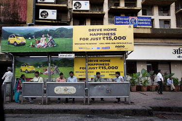 An advertisement on a bus stop for the Tata Nano, called the One Lakh car, and often billed as the world's cheapest car. India, with its booming middle class, has an insatiable demand for small, compa...