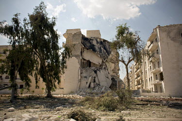 War damaged buildings at an intersection in Aleppo.