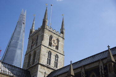 The Shard, Western Europe's tallest building at 310 metres, rises behind Southwark Cathedral in London.