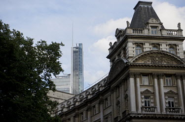 Heron Tower, 110 Bishopsgate, City of London, rises beyond a building in Finsbury Circus. Heron tower was, in 2012, London's second tallest building, rising 242 metres over 46 floors. It was completed...
