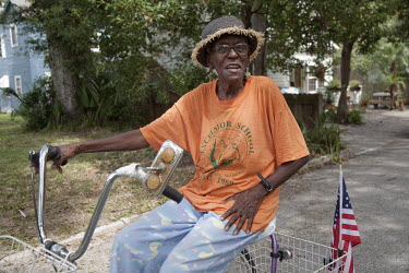 77 year old Carrie Johnson, known as 'The voice of Lincolnville', on her tricycle in St Augustine, Florida. Talking about the US Presidential election that will be held on 6 November, 2012, she says:...