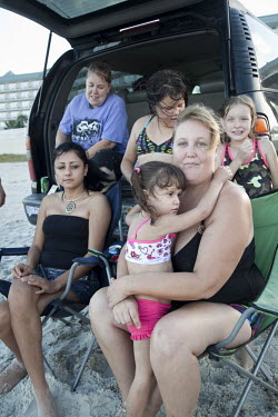 The Herera family tailgating on Daytona Beach, Florida.Heather's (nearest camera) husband is from Mexico and they have five children. Talking about the US Presidential election that will be held on 6...