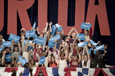 Students from Florida State University and Florida A&M University wave and cheer while waiting for Michele Obama to appear at a rally for her husband in Tallahassee, Florida. The US Presidential elect...