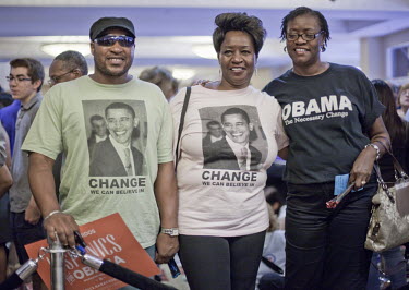 Three supporters of President Obama at a campaign rally in Orlando, Florida where former President Bill Clinton made a speech. Benny Beckham (left) is a construction worker, Barbara Kendricks (centre)...