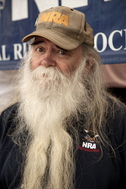 James McClean, an NRA (National Rifle Association) recruiter outside the West Palm Beach gun show in Florida. Talking about the upcoming presidential election: 'A monopoly on force benefits only gover...