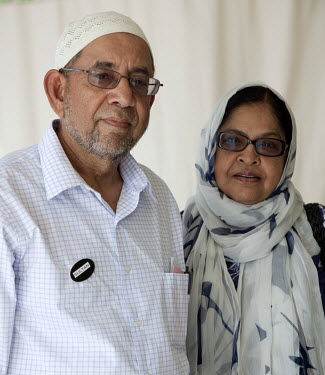 Sultan Siedigi, a retired chemical engineer and Amna, his wife, outside the Muslim Community of Palm Beach County Mosque in Florida. Speaking about the upcoming presidential election Sultan says: 'We...