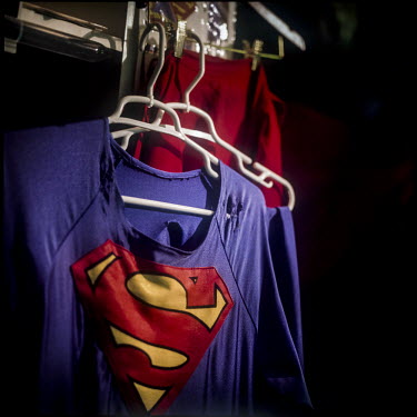 Superman paraphenalia in 45 year old Christopher Dennis' apartment. Christopher wears a Superman costume on Hollywood Boulevard, entertaining tourists and posing for photographs with them for the last...