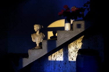 Statues on a stairway at a middle class Roma home. Buzescu is known for it's ultra-wealthy Roma and their bizarre mansions that line the main street. The Roma of Buzescu are part of the Kalderash clan...