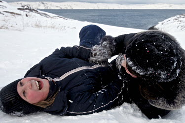 Two girls play in the snow in the town of Teriberka, a former prosperous fish-processing community in Russia's Arctic region. Teriberka's population shrunk from about 14,000, at its height, to just ov...