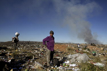 San women scavange for food on a local rubbish dump near their homes in the Northern Cape.In the 1970s, San Bushmen from the Khwe and !Xun tribes in Namibia and Angola were duped and coerced into join...