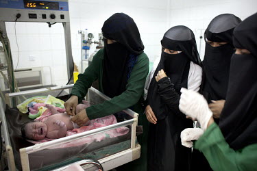 Students at the Health Science Institute in Houdeidah attend to a new born baby during a class in midwifery. Many of the young women at this college come from the surrounding countryside and the plan...