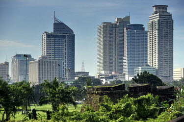 The skyscrapers of Malate Business District seen from the walls of Intramuros, the original walled citadel built by the Spanish in the 16th Century.