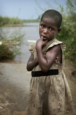 A child plays in a river beside the road from Bujumbura to Bururi Province. This area is in one of the four provinces in Burundi are severly affected by Neglected Tropical Diseases such as Onchocerchi...