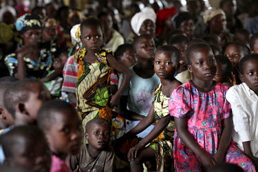 People gathered at the Msaua Adventist Church to listen to a health campaign talk in their village. Four provinces in Burundi are severly affected by Neglected Tropical Diseases such as Onchocerchiasi...