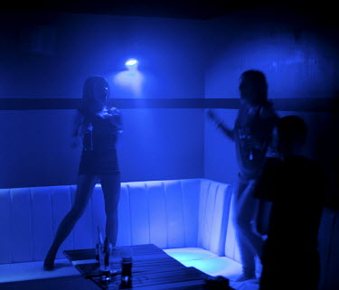 Girls dance during a disco polo concert by the band After Party at the Eden club in Trojany near Warsaw. Disco polo is a type of dance music which originated in rural areas of Poland.Though considered...