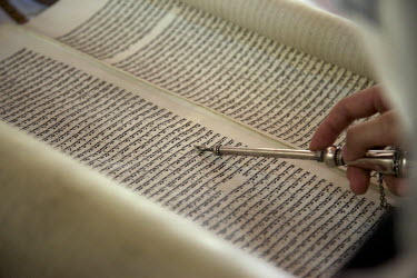 A man reads from the Torah using a metallic yad, or 'hand' in Hebrew. He belongs to a community, one of many worldwide, of so-called 'lost Jews'. These communities, often previously Christians, claim...