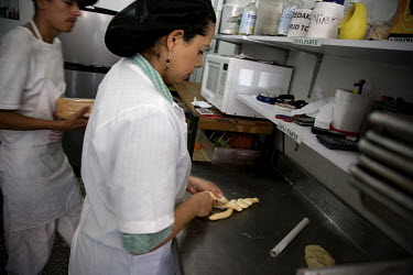 Galit Zapata prepares bread in the family's kosher bakery which carries her first name. Her family belong to a community, one of many worldwide, of so-called 'lost Jews'. These communities, often prev...