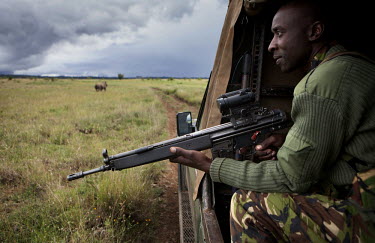 Jacob Miritia, a ranger on the Lewa Wildlife conservancy, on a patrol protecting Rhino from the ever present threat of heavily armed poachers. The Lewa Wildlife Conservancy, a non profit organisation,...