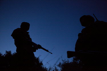 Rangers during a night patrol on the Lewa Wildlife conservancy patrolling the Subuiga area, protecting Rhino from the ever present threat of heavily armed poachers. The Lewa Wildlife Conservancy, a no...