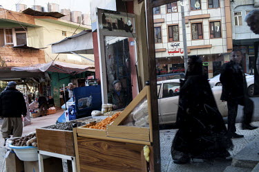 People shop around a traditional bazaar.