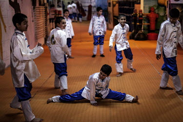 Boys train at a martial arts class.