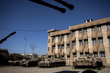 Tanks in front of the former security building of Saddam Hussein which was destroyed in 1991.